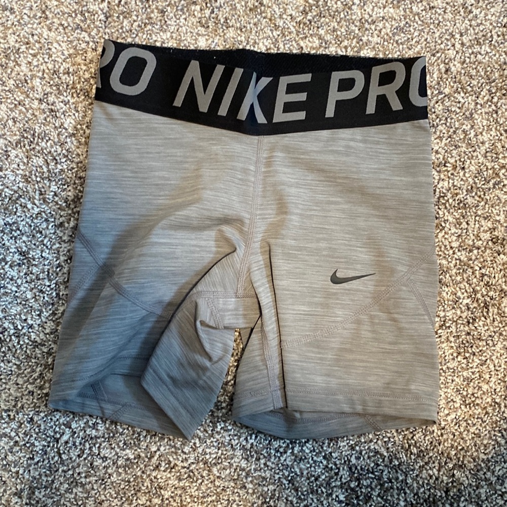 Heathered grey Nike Pros